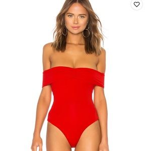 Lovers and friends red Neil bodysuit. Off shoulder/ back detail. SMl